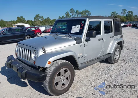 2011 Jeep Wrangler Unlimited Sahara from USA, damaged, VIN 1J4BA5H18BL522774